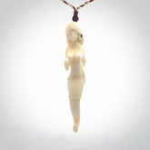 This pendant is a gorgeous and intricately carved mermaid and merman pendant. Carved by renowned bone carver Yuri Terenyi for us, this is a little masterpiece. The craftsmanship displayed in this piece is extraordinary - a collectors item, or a piece to wear and love.